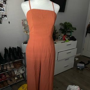 Orange jumpsuit with detailed back